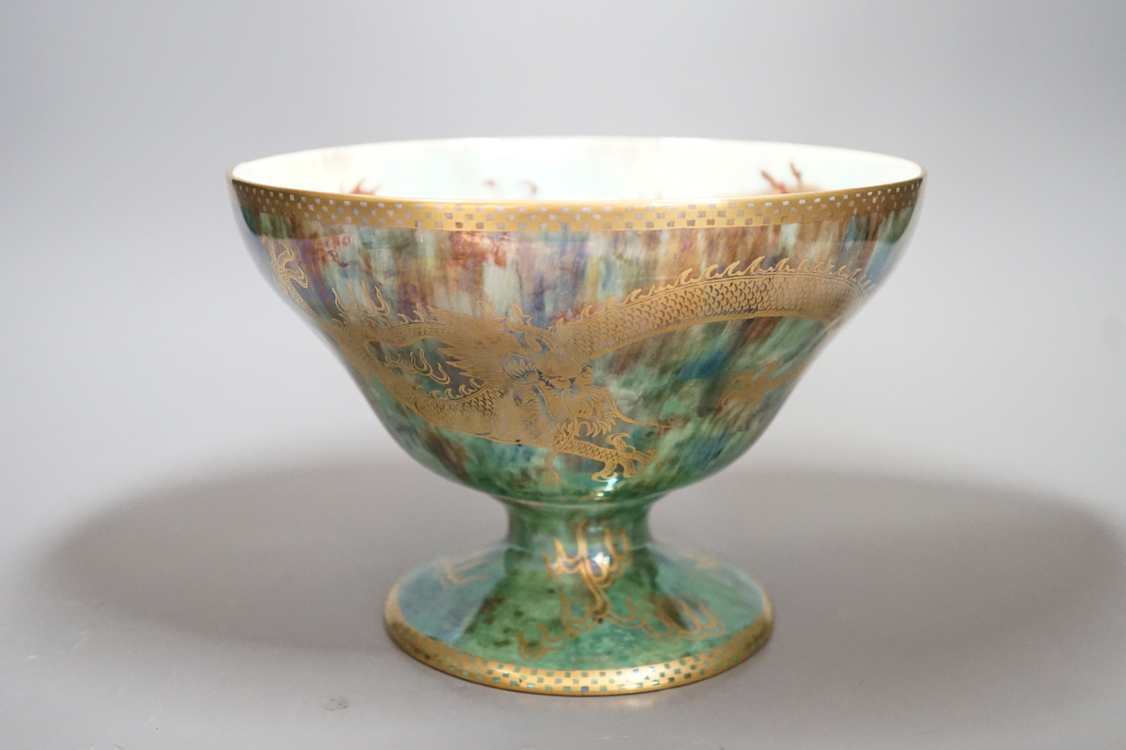 A Wedgwood dragon lustre pedestal bowl, designed by Daisy Makeig-Jones, pattern z4831, 14cms high